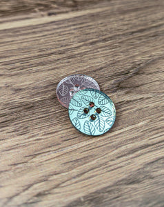 Engraved leaf buttons